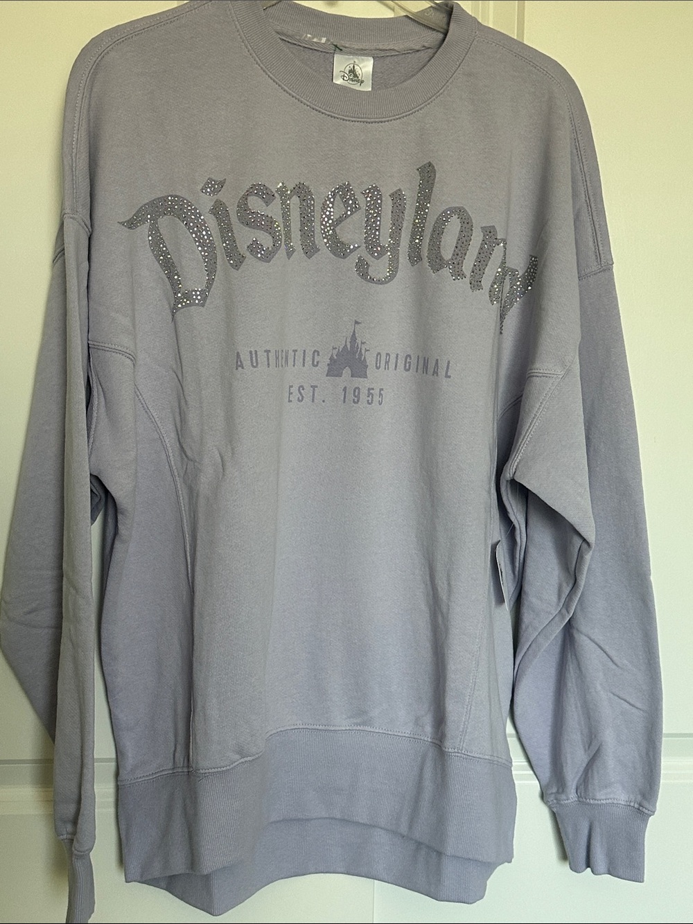 NWT Disney Disneyland Lavender Crewneck Sweatshirt with Rhinestone Sparkle Logo
